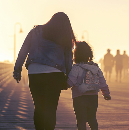 adult-child walking away